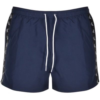Shop Calvin Klein Logo Swim Shorts Navy
