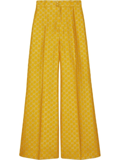 Shop Gucci Gg Jacquard Flared Trousers In Yellow