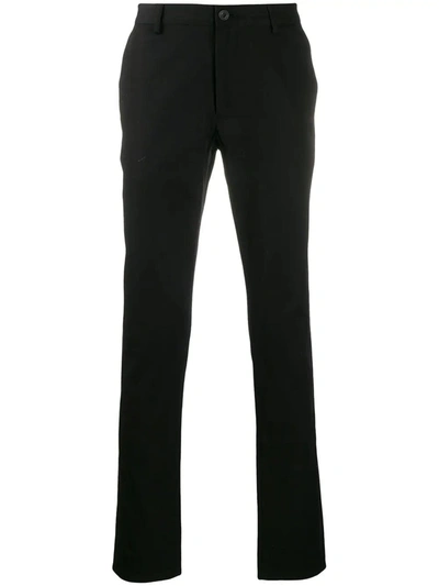 Shop Burberry Slim-fit Chinos In Black