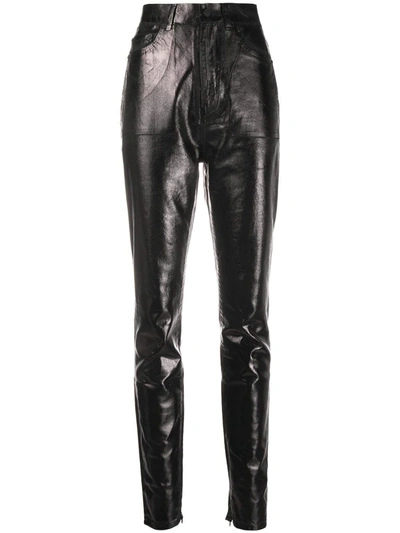 Shop Saint Laurent High-waisted Leather Effect Trousers In Black