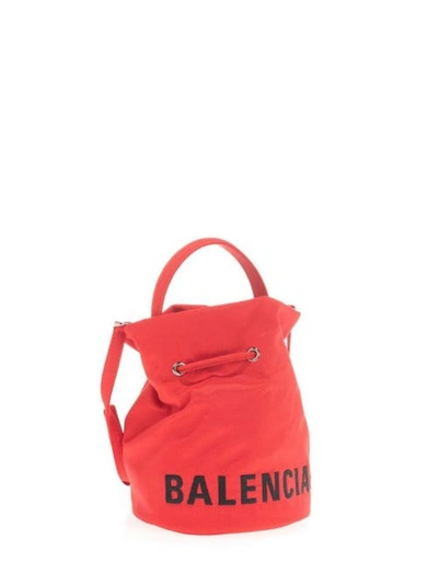 BALENCIAGA: Bucket Wheel bag in nylon - Fuchsia  Balenciaga mini bag  619458 H852N online at