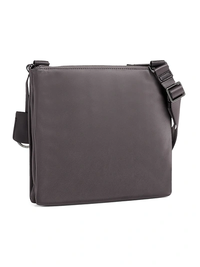 Shop Tumi Tula Leather-trim Crossbody Bag In Iron Black