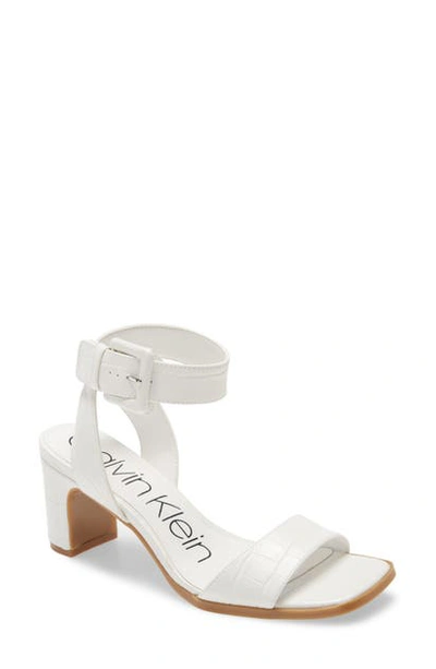 Shop Calvin Klein Damita Ankle Strap Sandal In White Faux Leather