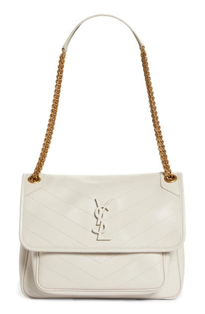 Shop Saint Laurent Medium Niki Leather Shoulder Bag In 9207 Crema Soft