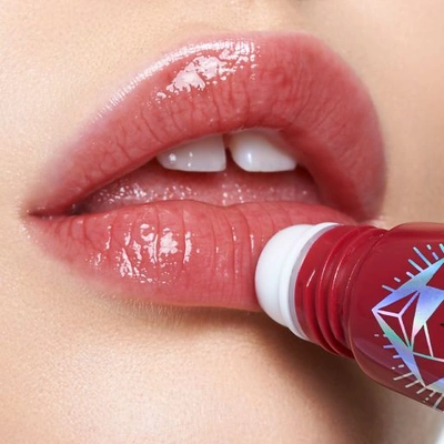Shop Charlotte Tilbury Charlotte's Magic Lip Oil Crystal Elixir - Berry Bliss