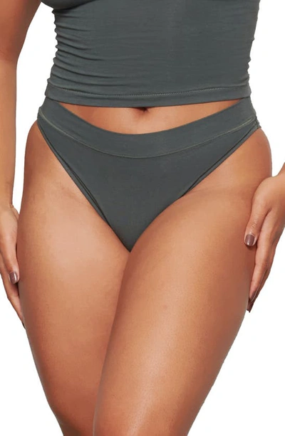 Shop Skims Cotton Jersey Tanga In Deep Sea