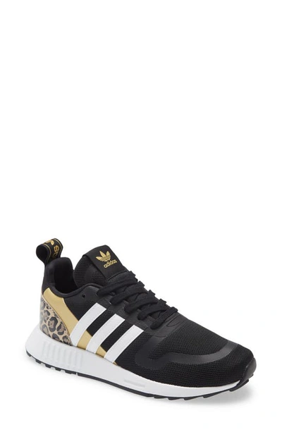 Shop Adidas Originals Smooth Runner Sneaker In Core Black/ White/ Gold
