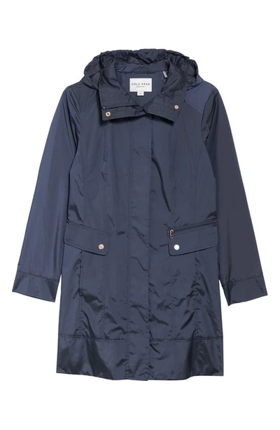Shop Cole Haan Signature Back Bow Packable Hooded Raincoat In Indigo