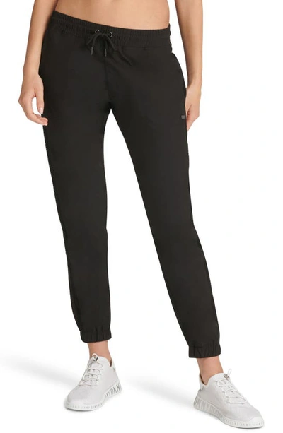 Shop Dkny Commuter Active Woven Joggers In Black
