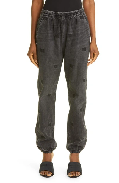 Shop Alexander Wang Embroidered Denim Joggers In Grey Aged