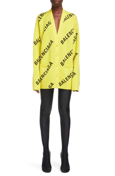 Shop Balenciaga Logo Oversize V-neck Cardigan In Yellow/ Black