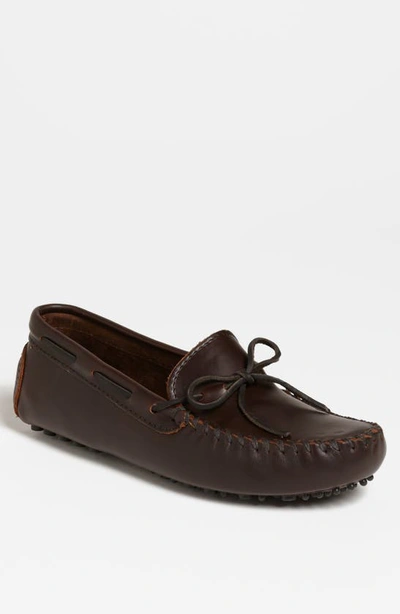 Shop Minnetonka Leather Driving Shoe In Dark Brown Lariat