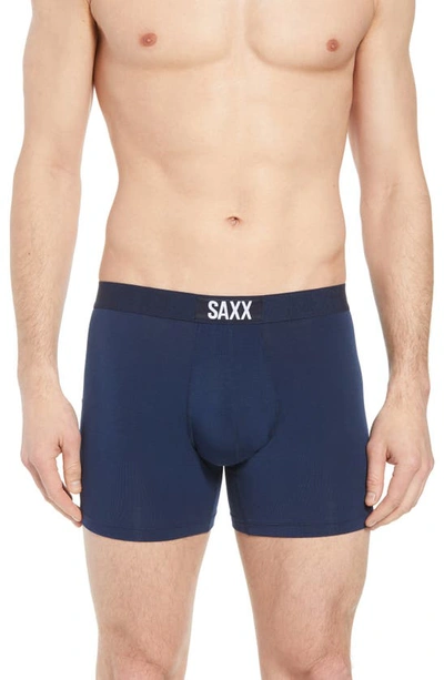 Shop Saxx Vibe Solid Performance Boxer Briefs In Navy
