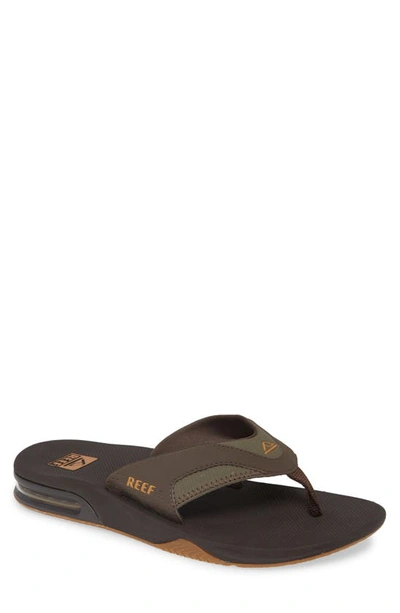 Shop Reef Fanning Low Flip Flop In Black/ Olive