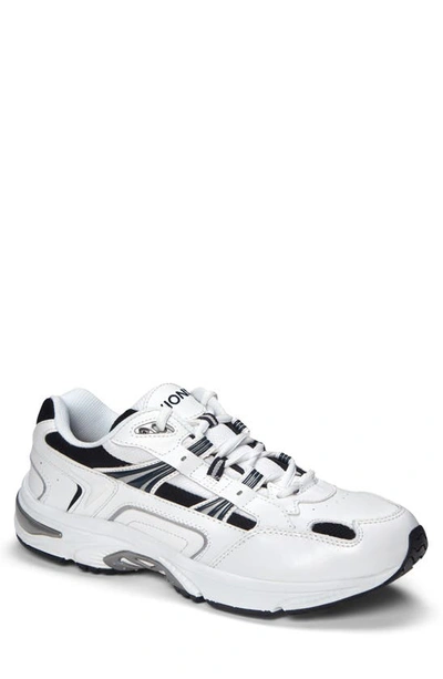 Shop Vionic Walker Sneaker In White/ Navy Leather