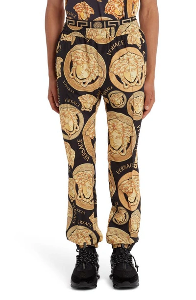 Shop Versace Medusa Amplified Joggers In Black/ Gold