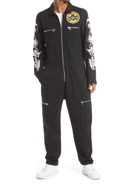 Shop Cult Of Individuality Cotton Graphic Jumpsuit In Black Twill