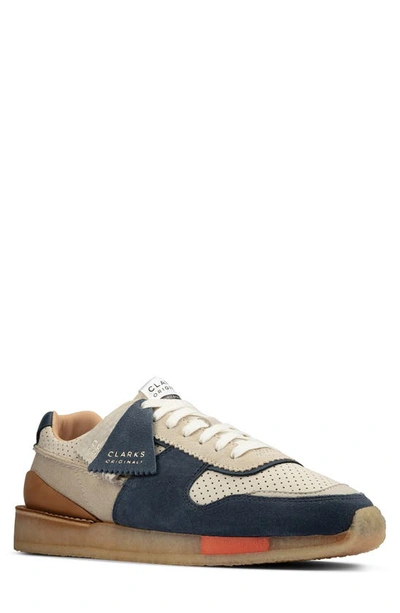 Shop Clarksr Torrun Sneaker In White/ Blue Suede