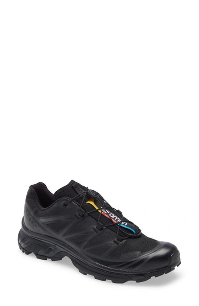 Shop Salomon Gender Inclusive Xt-6 Sneaker In Black/ Black/ Phantom