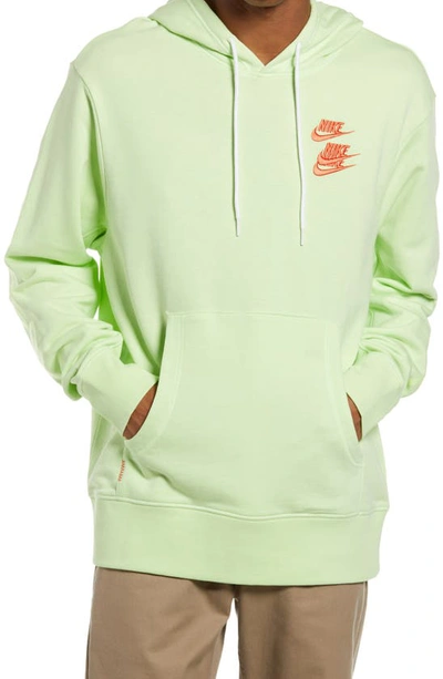 Shop Nike Sportswear World Tour Graphic Hooded Sweatshirt In Light Liquid Lime