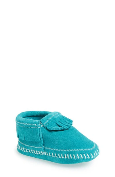 Shop Minnetonka 'riley' Fringe Suede Bootie In Turquoise