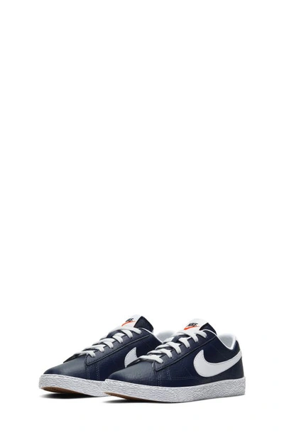 Shop Nike Kids' Blazer Low Sneaker In Navy/ White/ Orange