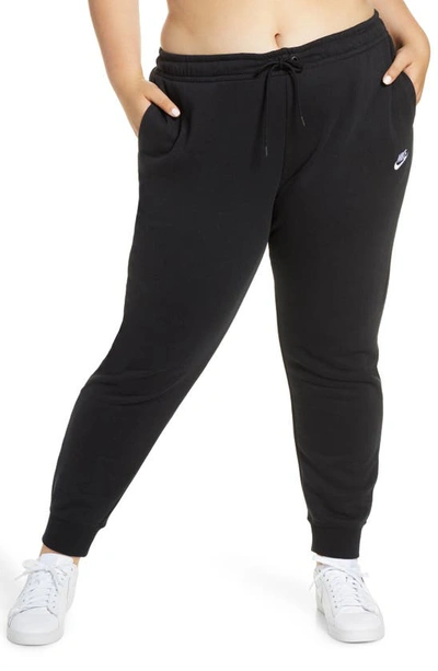 Shop Nike Sportswear Essential Fleece Pants In Black/ White