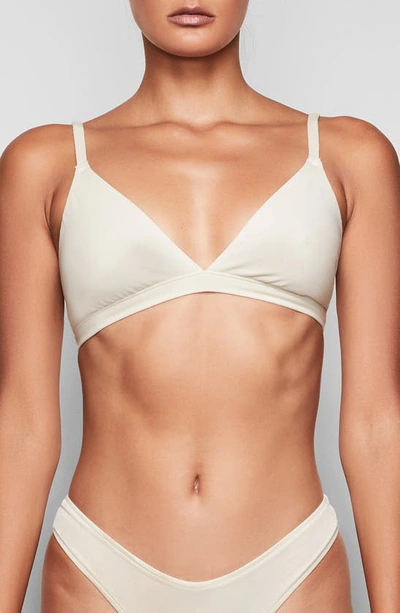 Shop Skims Stretch Cotton Rib Triangle Bralette In Bone