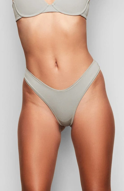 Skims Cotton Dipped Thong In Mineral