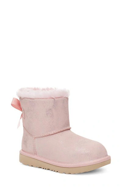 Shop Ugg (r) Kids' Mini Bailey Bow Ii Shimmer Boot In Pink Cloud