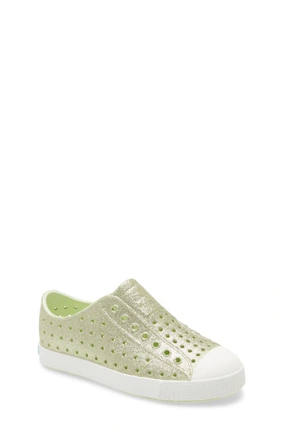 Shop Native Shoes Jefferson Bling Glitter Slip-on Vegan Sneaker In Cucumber Bling/ Shell White