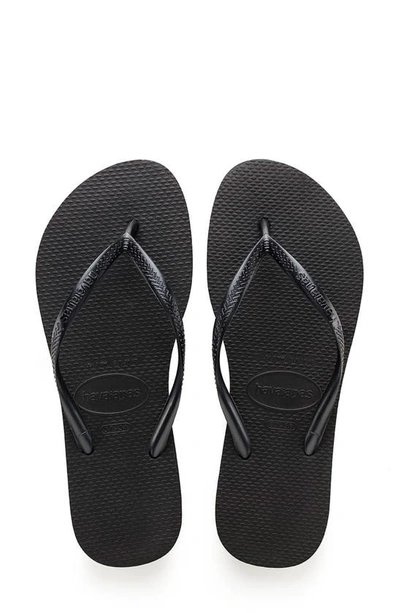 Shop Havaianas Slim Flip Flop In Black