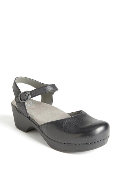 Shop Dansko 'sam' Clog In Black Full Grain