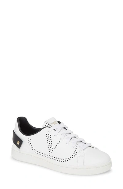 Shop Valentino Backnet Perforated Sneaker In White/ Black