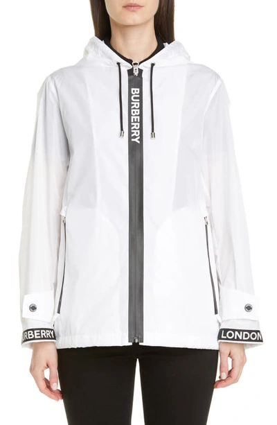 Shop Burberry Everton Logo Tape Hooded Rain Jacket In Optic White