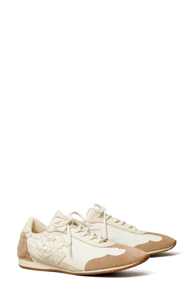 Shop Tory Burch Tory Sneaker In White/ New Ivory