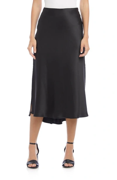 Shop Karen Kane Side Slit Bias Cut Midi Skirt In Black