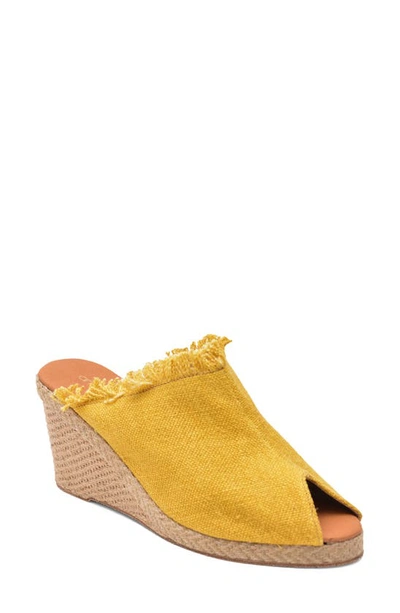 Shop Andre Assous Popy Frayed Wedge Mule In Saffron Leather