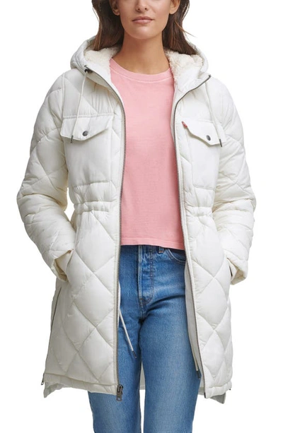 Shop Levi's Puffer Jacket With Fleece Lined Hood In Cream