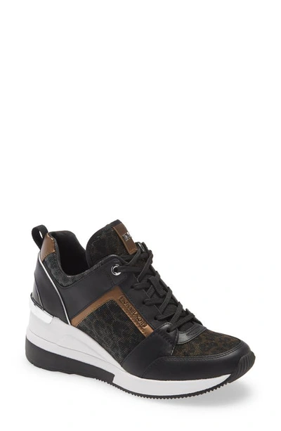 Shop Michael Michael Kors Georgie Wedge Sneaker In Black/ Bronze Glitter