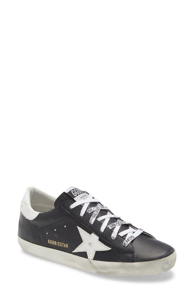 Shop Golden Goose Super-star Low Top Sneaker In Black Leather