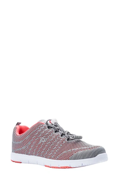 Shop Propét Travelwalker Evo Mesh Sneaker In Coral/ Grey Fabric