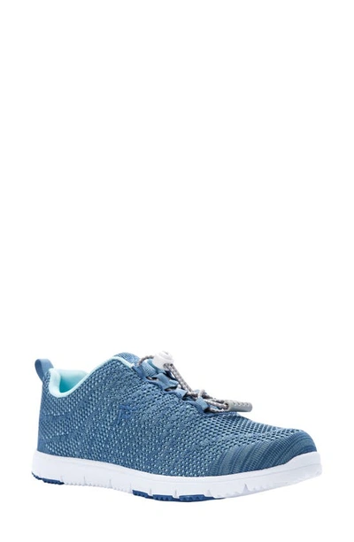 Shop Propét Travelwalker Evo Mesh Sneaker In Denim/ Light Blue Fabric