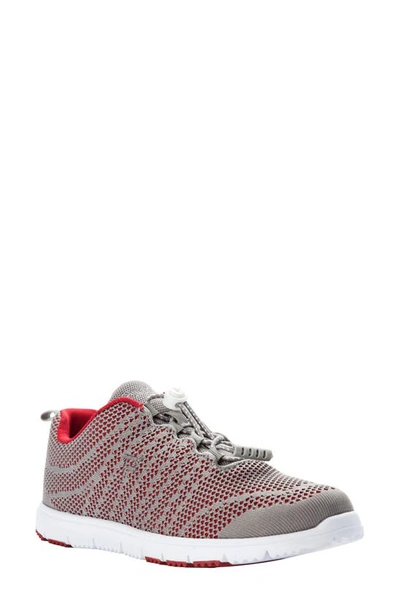 Shop Propét Travelwalker Evo Mesh Sneaker In Grey/ Crimson Fabric