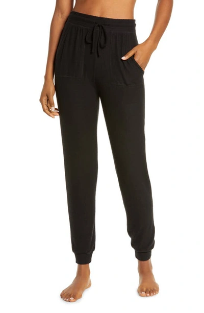 Alo Yoga Soho Mid-rise Stretch-jersey Jogging Bottoms In Black