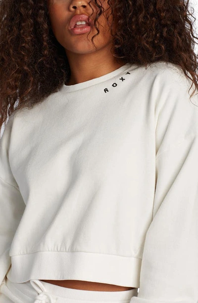 Shop Roxy Over The Moon Crop Sweatshirt In Snow White