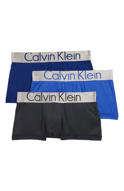 Shop Calvin Klein 3-pack Low Rise Trunks In Blue Combo
