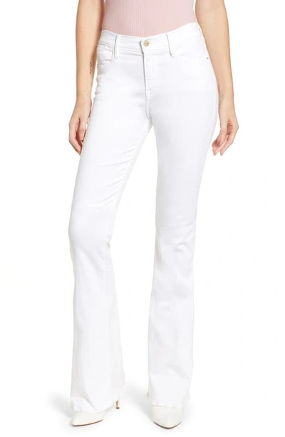 Shop Frame Le High Flare Jeans In White