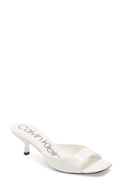 Shop Calvin Klein Mega Kitten Heel Slide Sandal In White Patent Leather