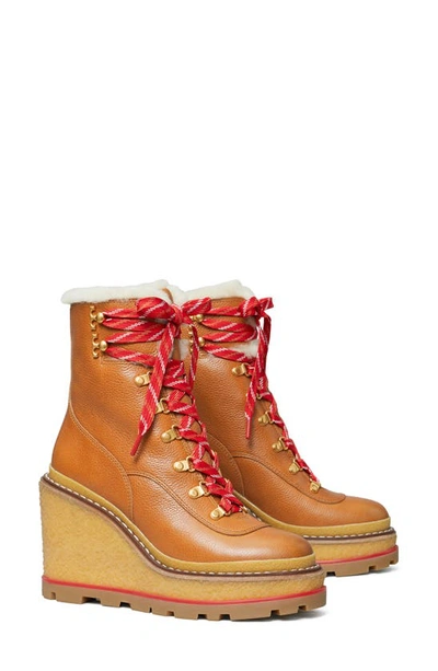 Shop Tory Burch Platform Wedge Hiking Boot With Genuine Shearling Lining In Blanched Almond / Bu